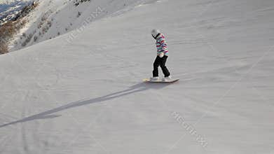 Snowboarder follow shot