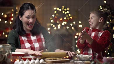 Family preparation holiday food. Cooking cookies.