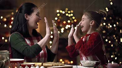 Family preparation holiday food. Cooking cookies.