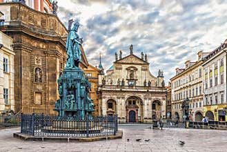 St Salvator Church and St Francis of Assisi Church near the monument to King Charles IV in Prague