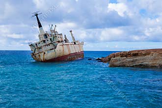 Old ship wreck and blue water beach. Travel photo 2018, december