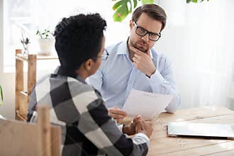 Suspicious male employer doubt about black applicant candidature