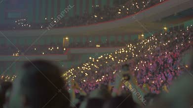 Large audience inside an arena