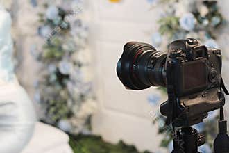 camera standing work in wedding