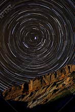 Star Trails around Polaris above a Sandstone Cliff