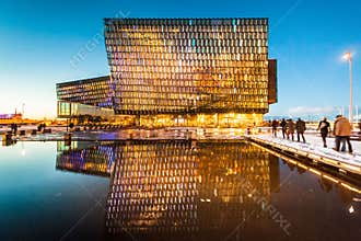 Harpa Concert Hall view during blue hour which is a concert hall and conference centre in Reykjavik, Iceland