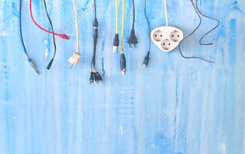 Various plugs,connectors and cables on grungy background, connectivity, connection metaphor,