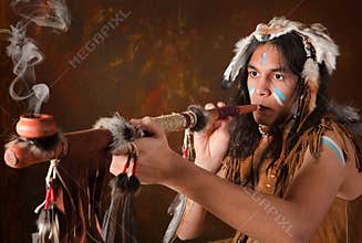 Indian with peace pipe