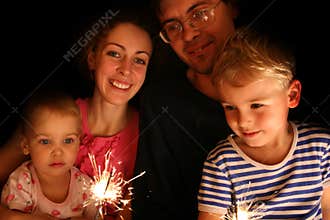 Family with sparkler