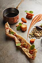 Pork crackling with sauces and vegetables