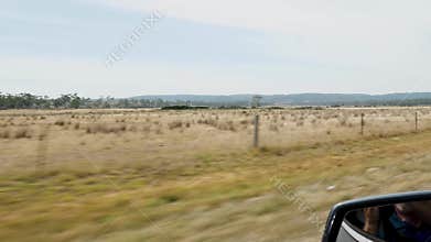 Australian country driving reflection in mirror