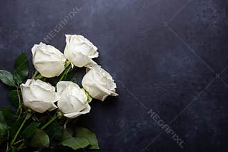 White rose flowers bouquet on black stone background Valentine&#x27;s day greeting card 