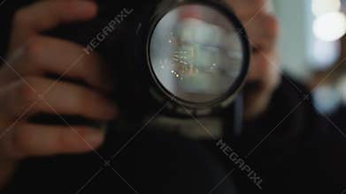 Man taking pictures with camera, paparazzi searching for shocking content