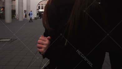 Girl freezing while waiting friends outdoor, cold hands, blood pressure problem