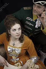 Baroque couple reeding book