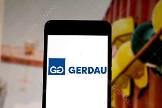 April 1, 2019, Brazil. Gerdau logo on the mobile device. Gerdau is a Brazilian steel company. It has industrial operations in 11