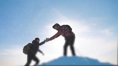 Teamwork business concept victory help hands arm slow motion video. team group tourist hikers gives a helping hand
