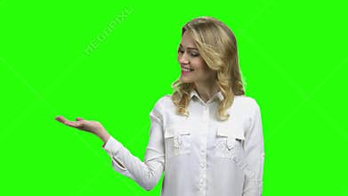 Business woman showing open hand palm with copy space.