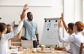 Business team voting concept, african coach and employees raise hands