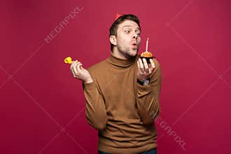 People, joy, fun and happiness concept. Relaxed happy birthday guy looking cheerful, smiling happily, posing for picture
