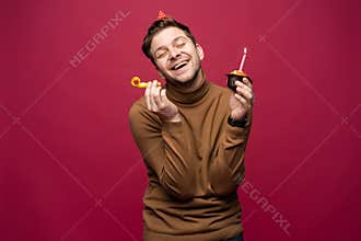 People, joy, fun and happiness concept. Relaxed happy birthday guy looking cheerful, smiling happily, posing for picture