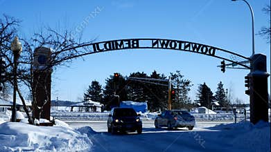 Bemidji, MN - 8 Feb 2019: Paul Bunyan and Babe the Blue Ox and Downtown Bemidji sign.