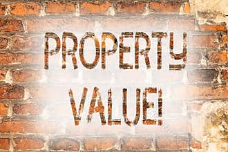 Writing note showing Property Value. Business photo showcasing Estimate of Worth Real Estate Residential Valuation Brick Wall art