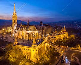 Budapest, Hungary - Aerial view of the illuminated Fisherman`s Bastion Halaszbastya and Matthias Church at dusk