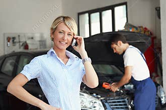 Woman in auto repair shop