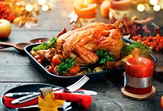 Thanksgiving dinner. Served table with roasted turkey