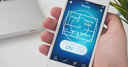 Turning on alarm system in the house using smartphone app