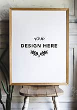 Photo frame mockup on a chair by the wall