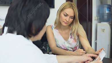 Doctor - beautician holds reception
