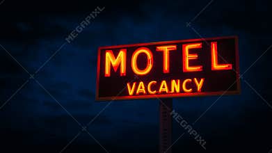 Motel Sign Lit Up At Night