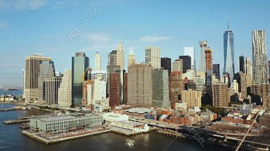 Aerial view of the capital of America. Brooklyn bridge through the East river to Manhattan in New York.