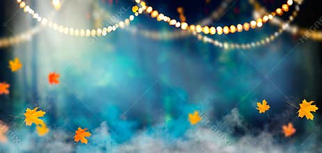 Fantasy Halloween holiday background. Dark misty forest