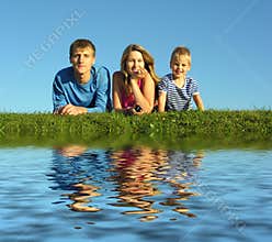 Family on herb with water