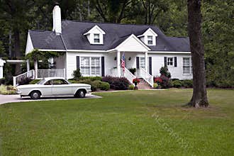 1950's House with Flag and Car