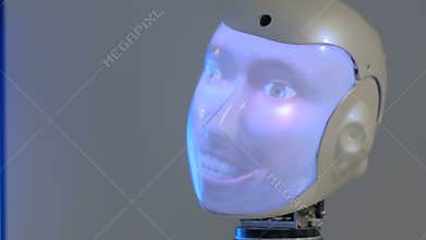 Funny humanoid robot with display face talking and moving head