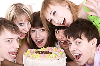 Group of teenagers celebrate birthday.
