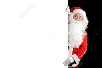 Happy Santa Claus holding blank advertisement banner background with copy space. Smiling Santa Claus pointing in white blank sign