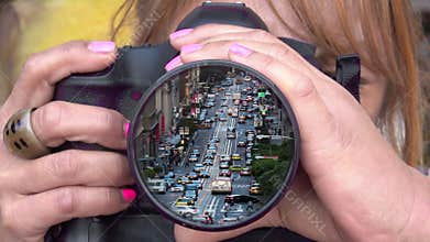 Closeup Female Photographer taking a Picture