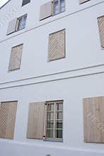 Windows with wooden covers