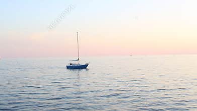 Toronto, ON, Canada - September 23, 2017 - short video of sunset on Lake Ontario with sailboat speedboats and jetskies