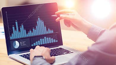 Businessman working on global financial trading growth analysis strategy using laptop.Modern business innovation