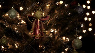 Christmas decoration on tree with bokeh lights in Christmas time