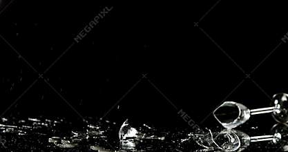 Champagne glass falling on black background 4k