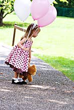 Child with balloons
