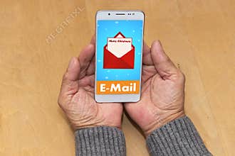 Merry Christmas, received an email on the phone. Christmas background template. An elderly man reads congratulations