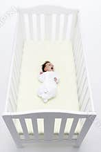 Newborn Baby In Cot